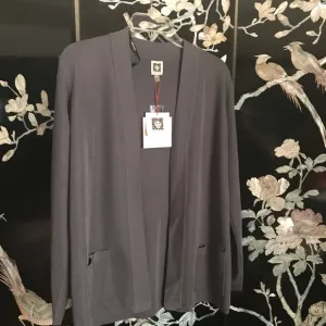 🦝 polyester long cardigan. NWT