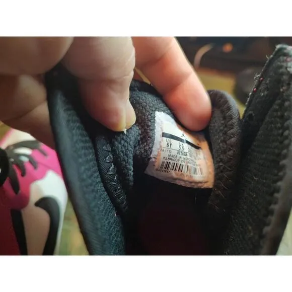 Air Jordan Retro High OG Pink and Black Sneakers