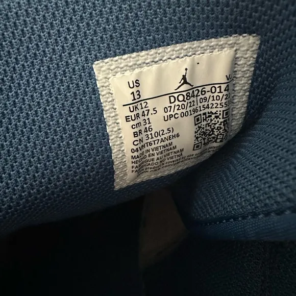 Nike Gray and Blue Sneakers with Classic Design