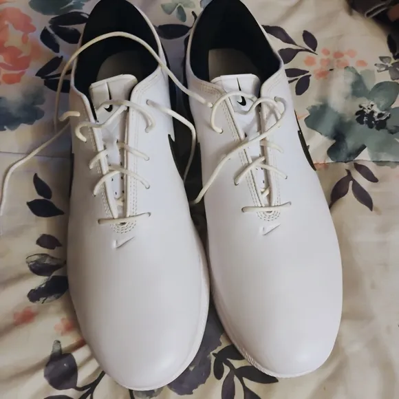 Nike White and Black Athletic Shoes with Sleek Design