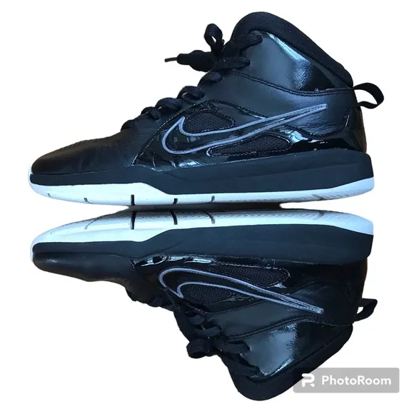 Nike | Youth black high top lace up shoes with white non-marking soles, size 5.5