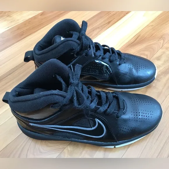 Nike | Youth black high top lace up shoes with white non-marking soles, size 5.5