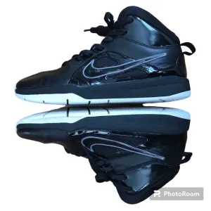 Nike | Youth black high top lace up shoes with white non-marking soles, size 5.5