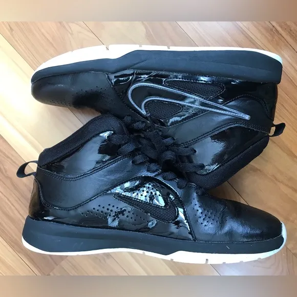 Nike | Youth black high top lace up shoes with white non-marking soles, size 5.5
