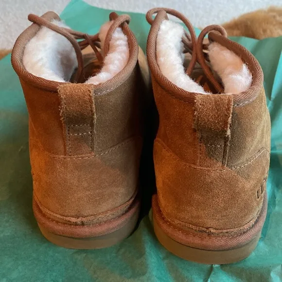 NWOT Men UGG Boots in Size 11.