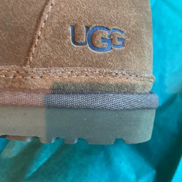 NWOT Men UGG Boots in Size 11.