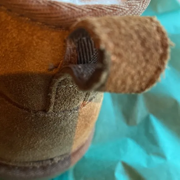 NWOT Men UGG Boots in Size 11.