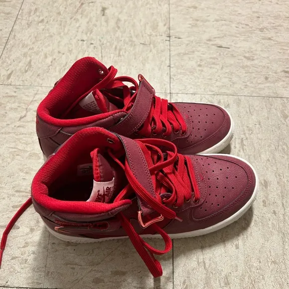 Red high top Nike shoes