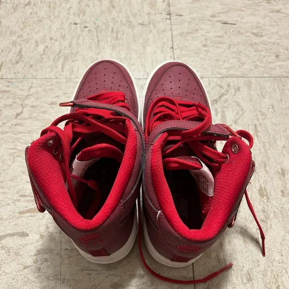 Red high top Nike shoes