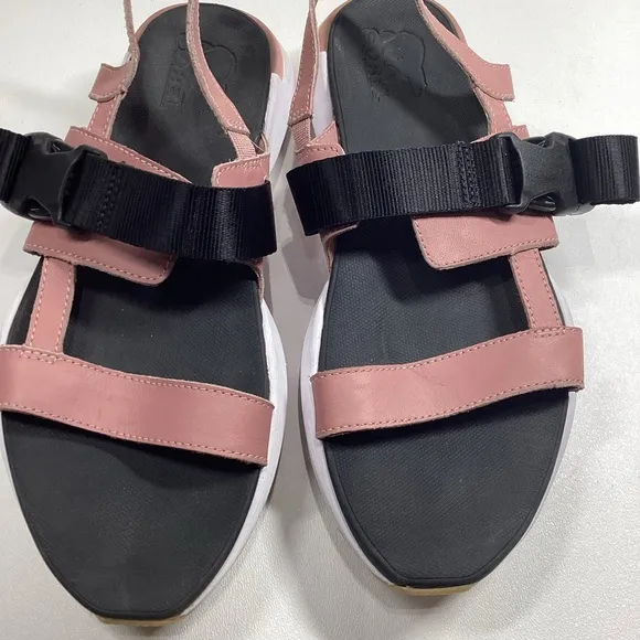 The sporty-chic SOREL® Kinetic™ Impact Sling sandals have the strappy leather up