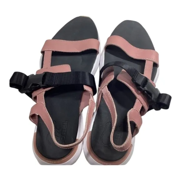 The sporty-chic SOREL® Kinetic™ Impact Sling sandals have the strappy leather up
